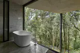 This 5,382-Square-Foot Home in Brazil Weaves Through the Forest on a Network of Piles - Photo 10 of 11 - 