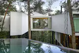 This 5,382-Square-Foot Home in Brazil Weaves Through the Forest on a Network of Piles - Photo 7 of 11 - 