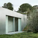 Wood Prefab Panels Cloaked in Galvanized Steel Form a Hillside Home in Barcelona - Photo 6 of 14 - 
