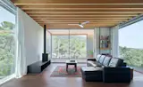 Wood Prefab Panels Cloaked in Galvanized Steel Form a Hillside Home in Barcelona - Photo 9 of 14 - 