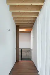 Wood Prefab Panels Cloaked in Galvanized Steel Form a Hillside Home in Barcelona - Photo 12 of 14 - 