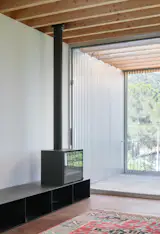 Wood Prefab Panels Cloaked in Galvanized Steel Form a Hillside Home in Barcelona - Photo 10 of 14 - 
