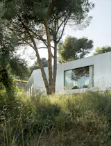 Wood Prefab Panels Cloaked in Galvanized Steel Form a Hillside Home in Barcelona - Photo 13 of 14 - 
