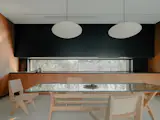 Massive Steel Panels Conceal (and Reveal) a Deceptively Airy Home in Tbilisi - Photo 8 of 17 - 