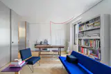 You Enter This Historic 860-Square-Foot Milan Apartment Through a New Metal Portal