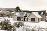 Sliding Window Shields Adjust Sunlight at This Scottish Country Home