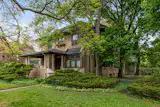 The restored home of Frank Navin features ornate woodwork, original fireplaces, and a basement vault tied to the history of Navin Field.