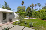 Exterior and side yard at the Wallace Neff Shell House in Pasadena, California
