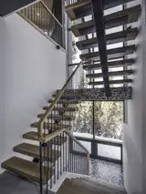 The back of the house opens up to the landscape and the northern light.