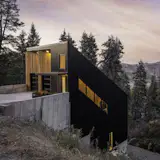 Chris Price of Klima Architecture designed an alpine home that mimics the grade of a steeply sloping site.