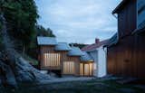 A Timber Extension Climbs the Hillside Behind This Rural Norwegian Home