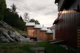 A Timber Extension Climbs the Hillside Behind This Rural Norwegian Home