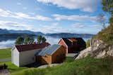 A Timber Extension Climbs the Hillside Behind This Rural Norwegian Home