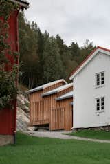 A Timber Extension Climbs the Hillside Behind This Rural Norwegian Home