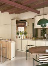 A Wavy Wardrobe Echoes Original Barrel Vaulted Ceilings in This Renovated Barcelona Flat