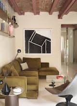 A Wavy Wardrobe Echoes Original Barrel Vaulted Ceilings in This Renovated Barcelona Flat