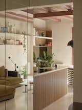 A Wavy Wardrobe Echoes Original Barrel Vaulted Ceilings in This Renovated Barcelona Flat
