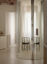 A Wavy Wardrobe Echoes Original Barrel Vaulted Ceilings in This Renovated Barcelona Flat