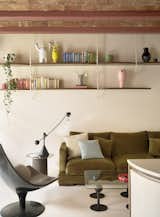A Wavy Wardrobe Echoes Original Barrel Vaulted Ceilings in This Renovated Barcelona Flat