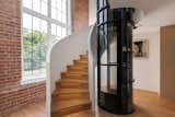 A Glass Elevator Rises Through This $2M Loft Inside a Former Toronto Factory