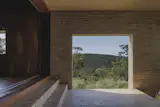 At an Australian Home Built Into a Cliff, You Enter Via the Footbridge - Photo 4 of 12 -