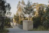 At an Australian Home Built Into a Cliff, You Enter Via the Footbridge