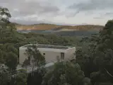 At an Australian Home Built Into a Cliff, You Enter Via the Footbridge