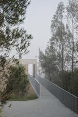At an Australian Home Built Into a Cliff, You Enter Via the Footbridge