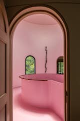 A Pink Stair With an Atrium and Bookshelves Revives This 1930s Mexico City Home