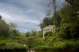 A Waterfall Rushes Through This $5.25M Mill Turned Residence in Upstate New York