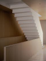 A Floating Stair “Sawtooths” Through the Heart of This Toronto Townhome