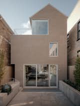 A Floating Stair “Sawtooths” Through the Heart of This Toronto Townhome