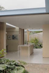 A Sawtooth Roof With Skylights Caps the Living Space of This Melbourne Home