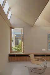 A Sawtooth Roof With Skylights Caps the Living Space of This Melbourne Home - Photo 14 of 19 - 