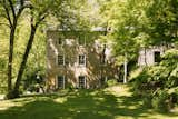 A Waterfall Rushes Through This $5.25M Mill Turned Residence in Upstate New York