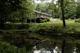 The Catskills home is located on the banks of the Shandalee Brook.