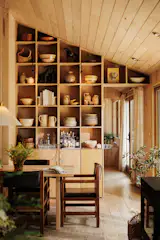 Built-in details abound, from shelving and seating to the kitchen cabinetry and various wardrobes.