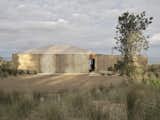 Floor-to-Ceiling Glass Sliders Peel Back Entire Walls at This Rammed Earth Home in New Zealand