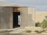 Floor-to-Ceiling Glass Sliders Peel Back Entire Walls at This Rammed Earth Home in New Zealand