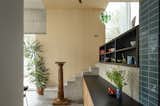 In Slovenia, Two 1950s Terrace Homes Trade Tiny Rooms for Light-Filled Vertical Layouts
