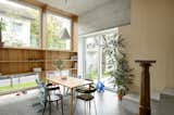 In Slovenia, Two 1950s Terrace Homes Trade Tiny Rooms for Light-Filled Vertical Layouts