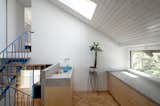 In Slovenia, Two 1950s Terrace Homes Trade Tiny Rooms for Light-Filled Vertical Layouts
