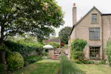 Peach, Ochre, and Neon-Green Paints Punch Up This £935K Cottage in Somerset