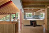 A Massive New Roof Turns a ’70s Chalet in Canada Into a Forest Palace