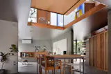 A Ceiling Cutout Above the Dining Area in This Kyoto Home Doubles as a Desk