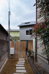 A Ceiling Cutout Above the Dining Area in This Kyoto Home Doubles as a Desk