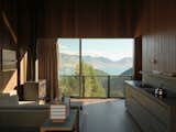 This New Zealand Tiny Cabin’s Glass Sliders Are So Big They Hang Off the Side