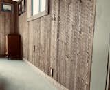 All throughout the cabin, except for the bathroom is the deconstructed wood siding.  