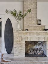Living Room, Wood Burning Fireplace, and Standard Layout Fireplace Exposed Brick Fireplace Detail  Photo 3 of 20 in Graham Bybee House by Kartwheel Studio