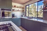Kitchen. Floating shelves. Lots of light and views while doing the dishes..